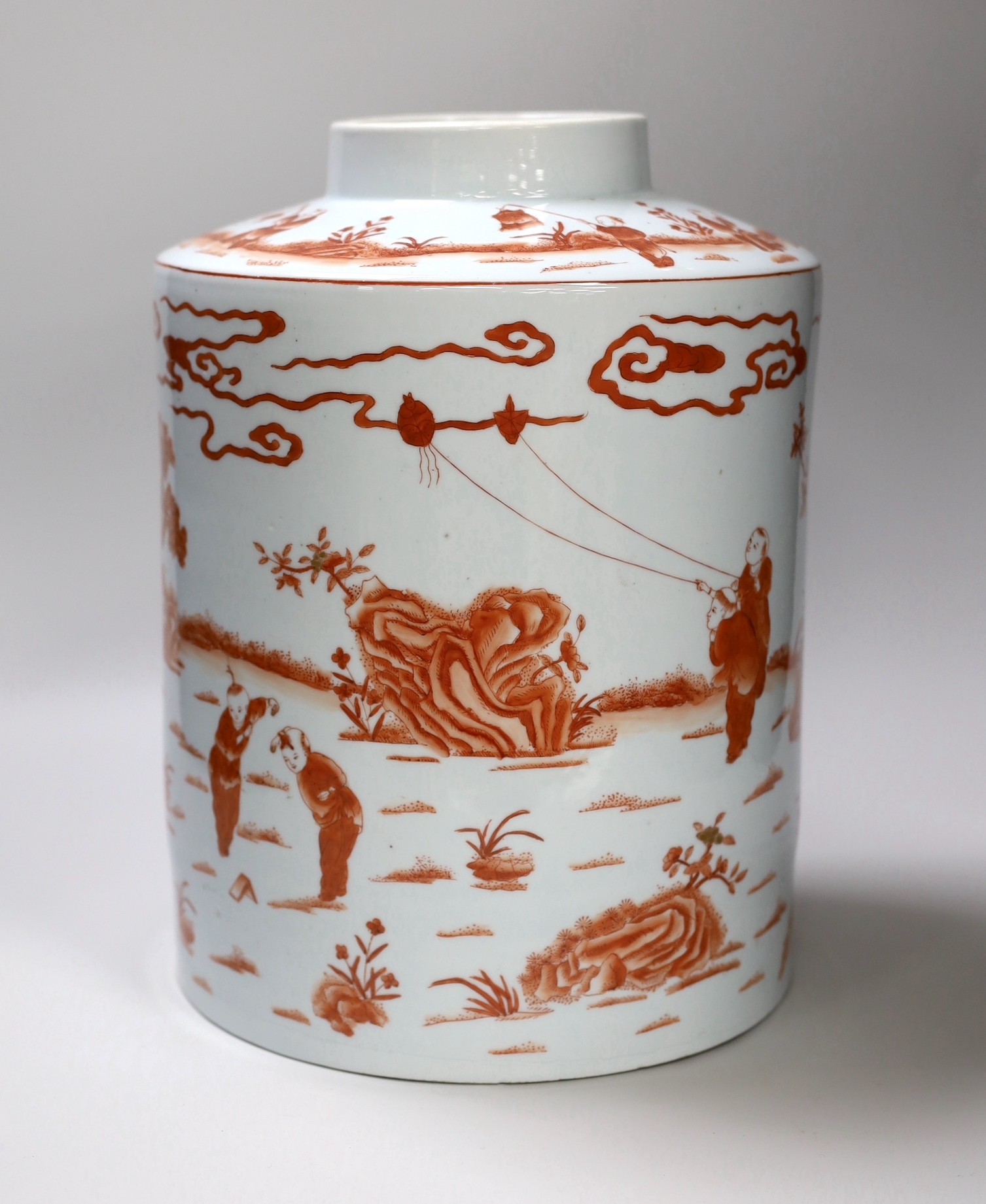 An early 20th century copper red enamelled canister. 30cm tall